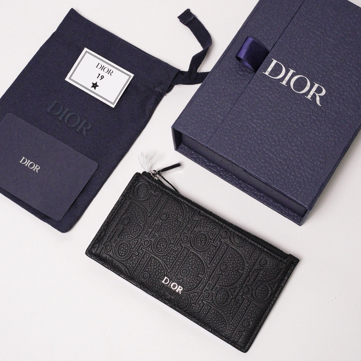 Dior Gravity 黑色皮革壓紋拉鏈卡夾