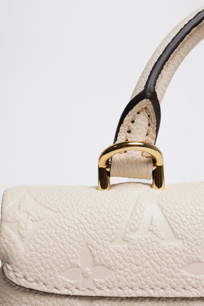 Louis Vuitton Nano Madeleine Monogram Empreinte 奶油色